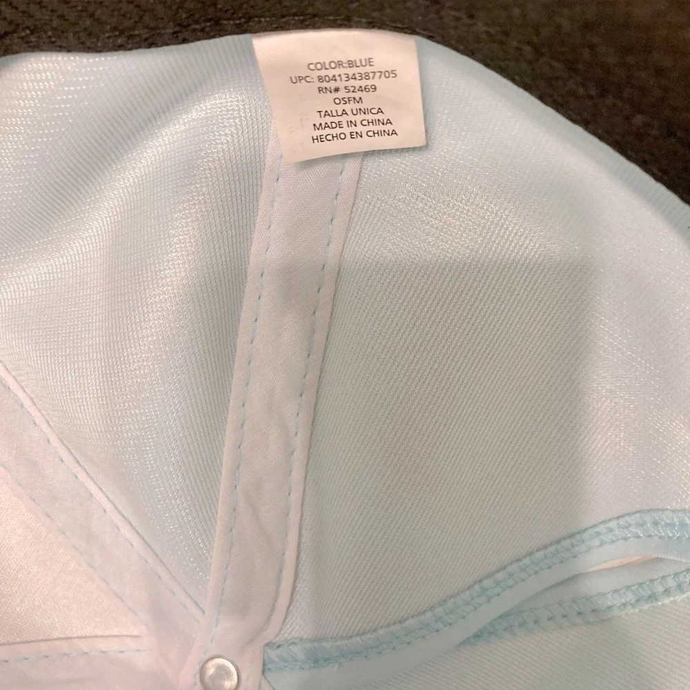 light blue baseball cap with reflective stripe on the peak self-adjusting .
